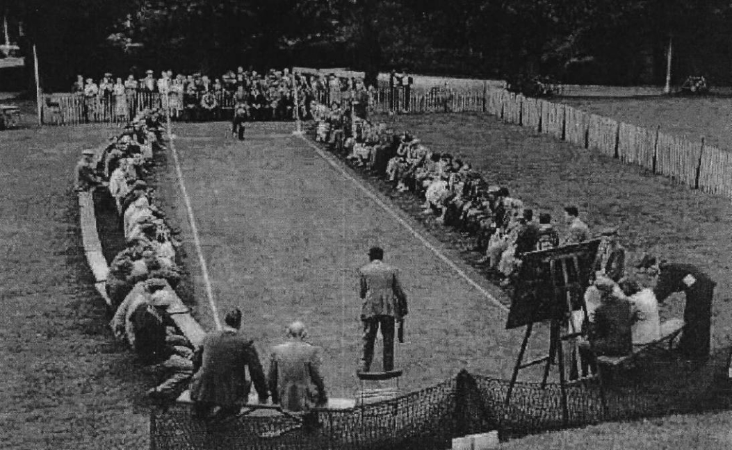 A group of people watching a tennis match
AI-generated content may be incorrect.